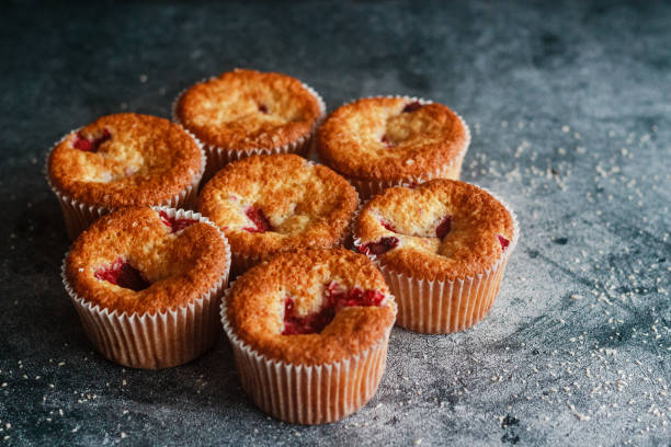 istock Delicious muffins with raspberries 1300156732