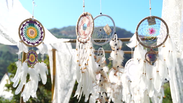 Native American Dream Catchers hanging and waving in a light wind