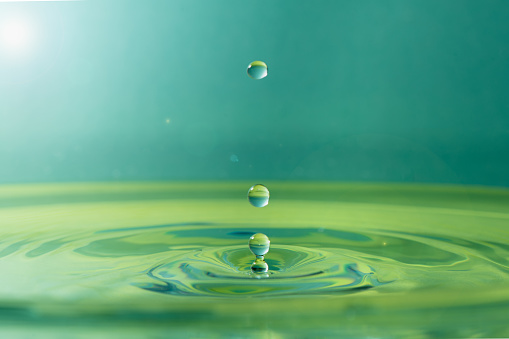 Splash: drops falling into the water - still life