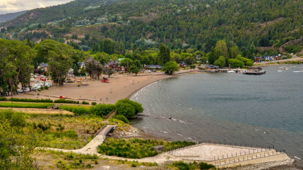 Landscape San Martin de los Andes Landscape of small town San Martin de los Andes and lake Lacar on a warm summer afternoon. Taken from the top of near by hill lácar lake photos stock pictures, royalty-free photos & images