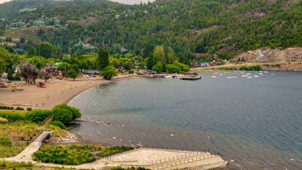 Landscape San Martin de los Andes Landscape of small town San Martin de los Andes and lake Lacar on a warm summer afternoon. Taken from the top of near by hill lácar lake photos stock pictures, royalty-free photos & images