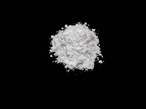 istock Cocaine drug powder on black background 1300162129