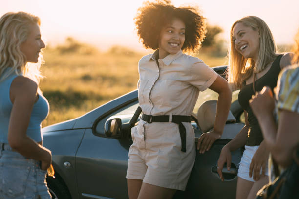 istock Female friends having fun on a road trip 1300167350