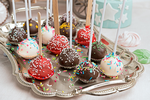 Fresh homemade pop cakes on a close look in different tastes
