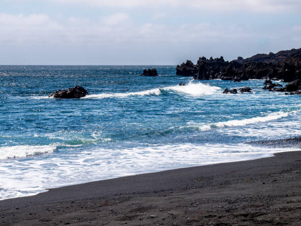 istock Typical black sand beach of volcanic origin 1300170516