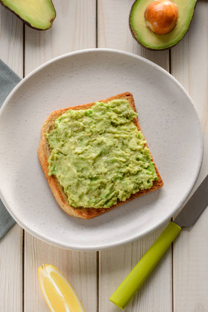 istock Toast with mashed avocado and lemon juice 1300170801