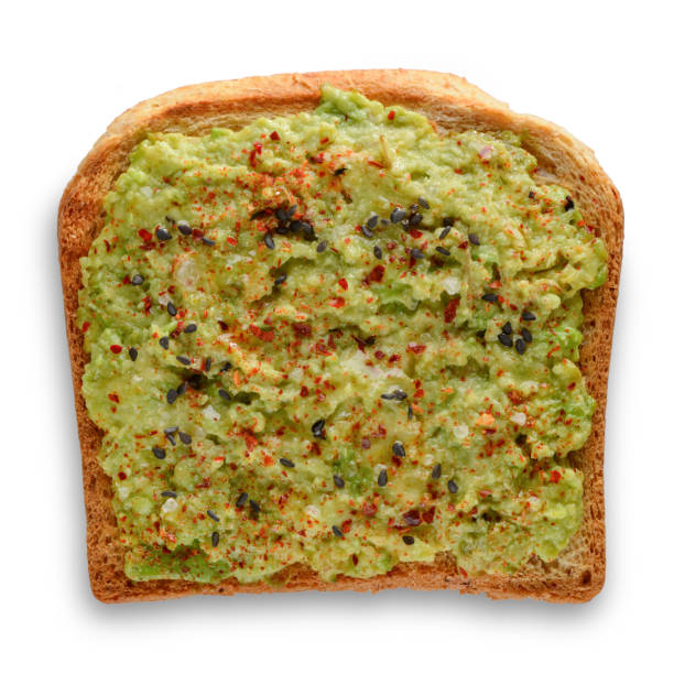 istock Mashed avocado toast with sesame seeds, paprika and salt 1300171939