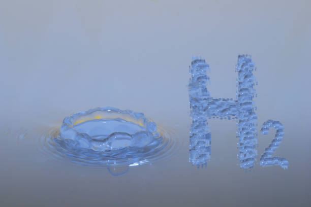 istock hydrogen h2 letters and a drop impact in a fluid 1300173385