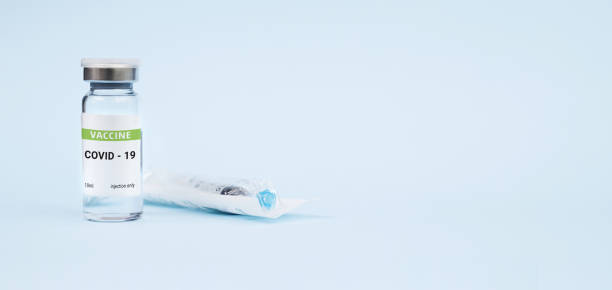 istock Vaccine against coronavirus, covid-19 concept. on a blue background. copy space, banner 1300175302