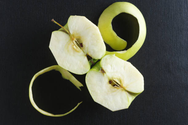 istock Two halves of an apple 1300176013