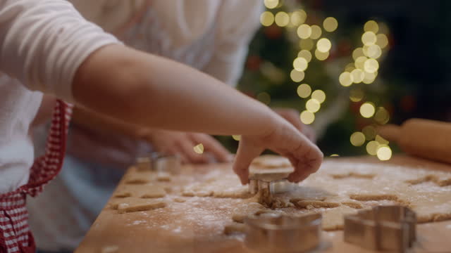 SLO MO Mother and daughter making Christmas cookies