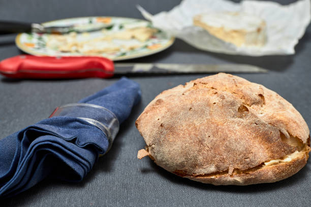 istock Sandwich of bread with cheese and a napkin 1300180701