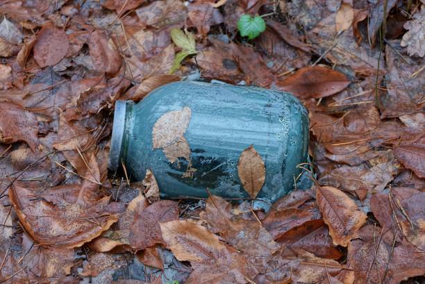 istock garbage from one dirty large gray glass jar 1300180851