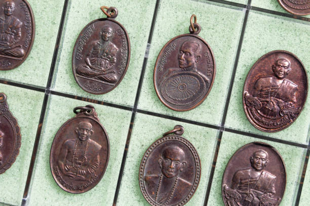 istock Phra Khuva Boonchum coins , Small Buddha image or Thai amulet 1300181930