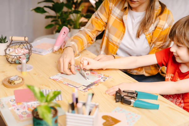 istock Making of handmade card from paper. DIY, hobby concept, gift idea, decor with 1300184807