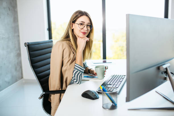 istock Beautiful female working from home 1300185136