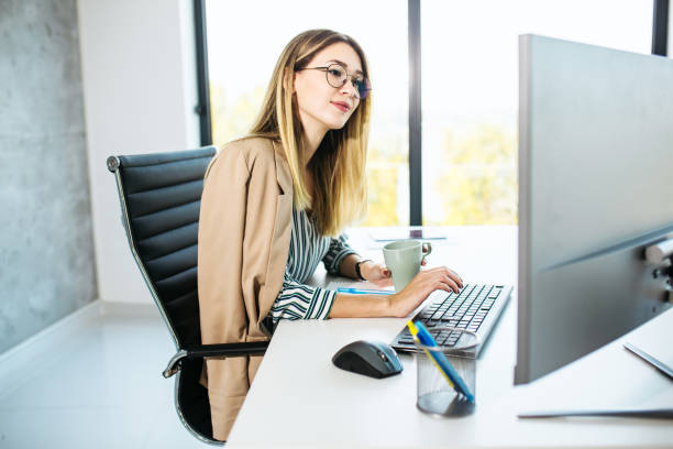 istock Beautiful female working from home 1300185788