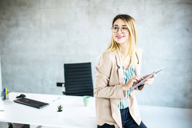 istock Beautiful female working from home 1300186096