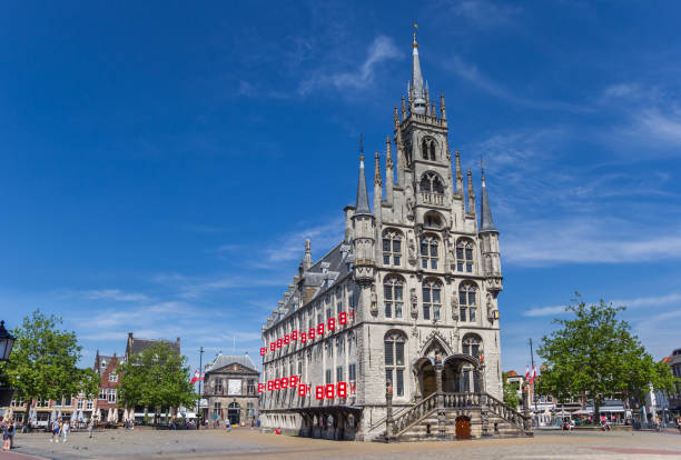 Historic town hall building on the central market square of Gouda Historic town hall building on the central market square of Gouda, Netherlands gouda south holland stock pictures, royalty-free photos & images