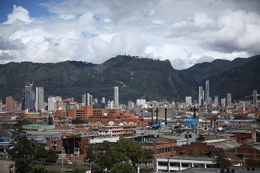 A view of the city of Bogota in Columbia on a cloudy day background