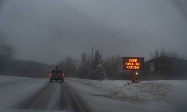 istock Vaccine sign during storm 1300189205