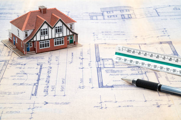 istock House construction plans with scale ruler and pen 1300191101
