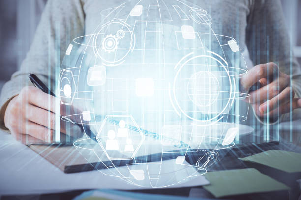 istock Social network theme hologram over hands taking notes background. Concept of global international people connect. Double exposure 1300193286