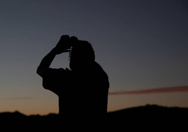 istock Silhouette of a Photographer 1300195304