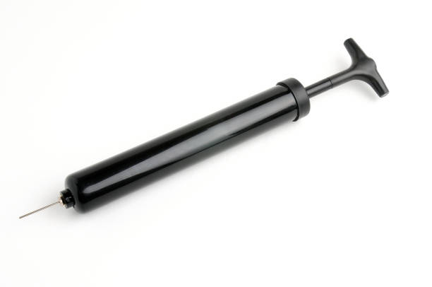 istock Pump and needle for pumping air on a white background 1300198771