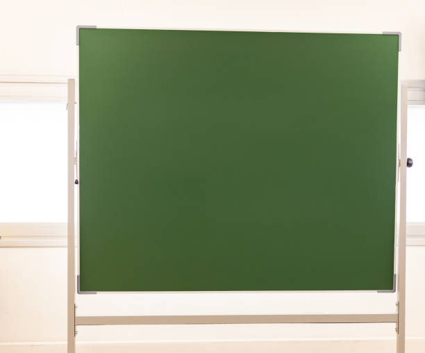 istock Green school blackboard to paint with colored chalks with free space for text 1300198853