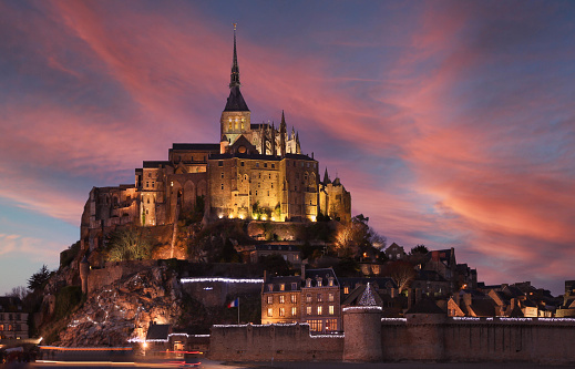 Abbey of Mont St. Michel, famous destination in France with colourful sky