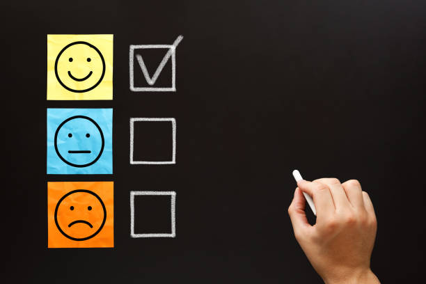 istock Happy Client Filling Out Feedback Survey 1300203267