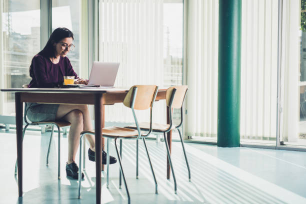 istock Busy female typing on laptop. 1300204589