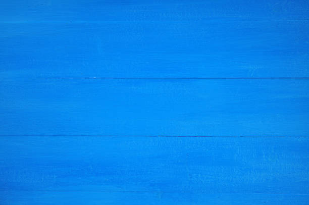 istock Blue color wooden background 1300208290