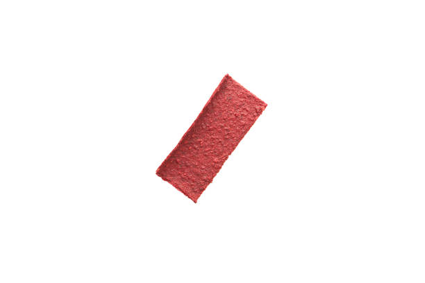 istock Beet chips isolated on white background. Healthy snack. Thin vegetable crispbread on rye sourdough. It can be used as base for vegan sandwiches 1300210311