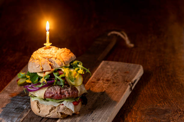 istock home made cheeseburger on dark wood 1300210543