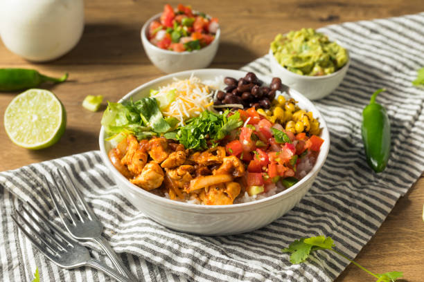 homemade healthy chicken burrito bowl - guacamole avocado mexican culture food imagens e fotografias de stock