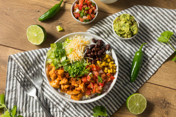 Homemade Healthy Chicken Burrito Bowl Homemade Healthy Chicken Burrito Bowl with Salsa Corn and Beans CHIPOTLE BURRITO stock pictures, royalty-free photos & images