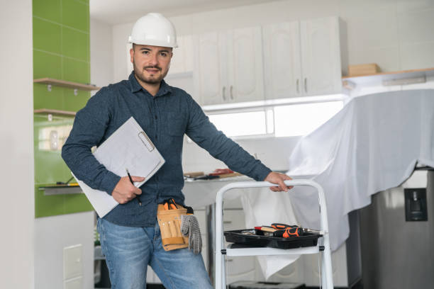 istock Contractor working on a house project remodeling the kitchen 1300212974