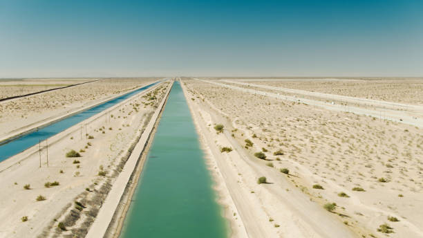istock Drone Flight Over Coachella Canal Between I-8 and Mexico Border 1300213812