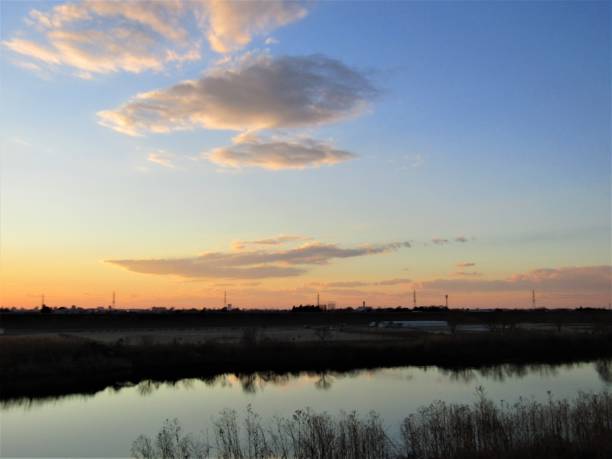 istock Japan. January. Sunset above Edogawa river. Dramatic sky. 1300215735