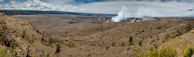 Halemaumau crater is a pit crater located within the much larger summit caldera of Klauea in Hawaii Volcanoes National Park. Halemaumau is home to Pele, Goddess of Hawaiian Volcanoes, according to the traditions of Hawaiian mythology. According to the Hawaii Volcano Observatory the crater is currently active, with lava in an open vent fluctuating from 70 to 150 meters below the crater floor.