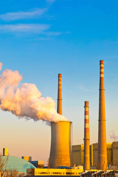 istock Industrial chimney in winter 1300222412