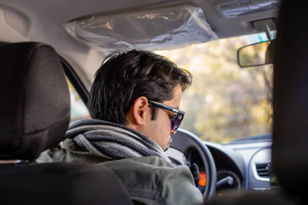 istock Portrait of a man inside a car 1300224936