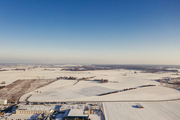 istock Aerial view of the trucks unloading at the logistic center. 1300227633