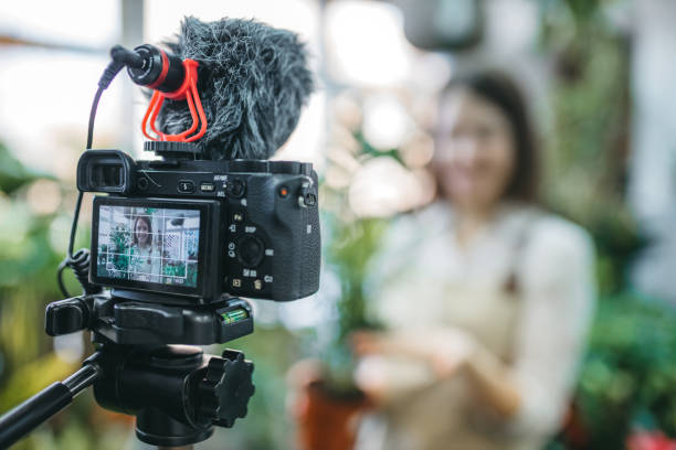 istock A modern woman recording an online tutorial on how to keep flowers in a pot 1300234144
