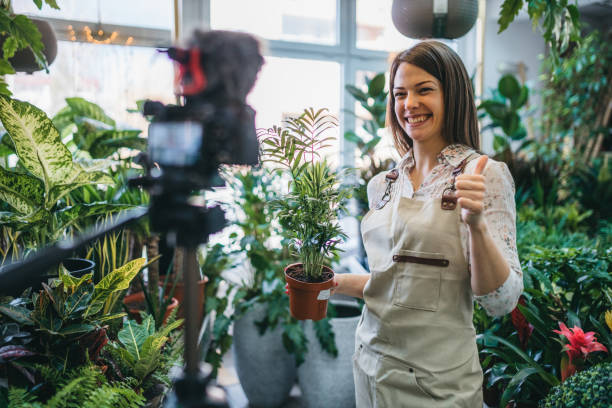 istock A modern woman recording an online tutorial on how to keep flowers in a pot 1300234185
