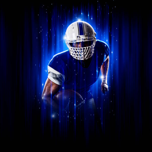 istock Hero Football Player wearing a blue uniform 1300238579