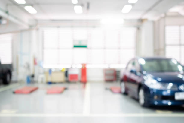 istock Auto repair shop in bokeh, defocused background 1300246715