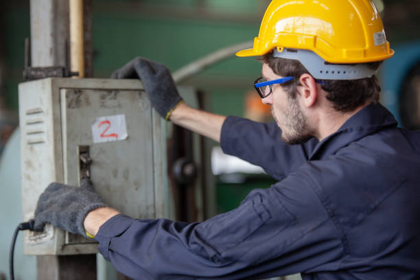 istock worker under inspection and checking production process on factory 1300259436